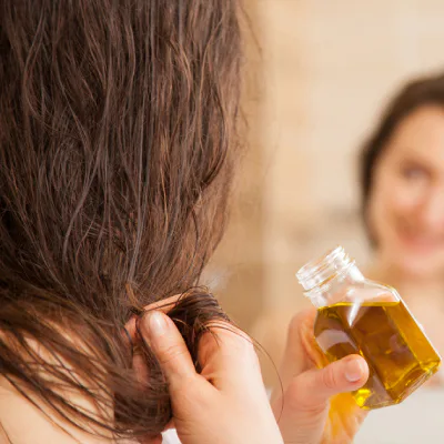 Coat and rinse hair before entering the pool